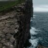 Dark ocean cliffs