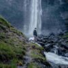 Person next to Fossá Waterfall