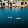 Two kayaks at sea