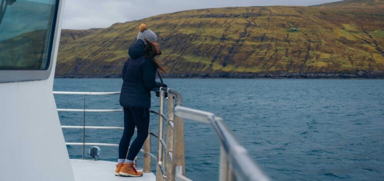 Lady on boat Tour in Faroe Islands