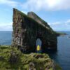Drangarnir Sea Arch hiker