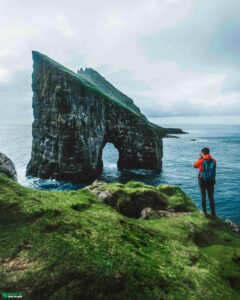 Drangarnir Sea Arch with person