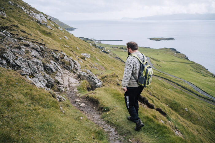 Man hiking to Kirkjubøur