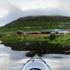 Kayak next to shoreline