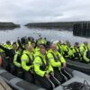 People sitting in rib-boat