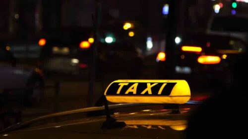 Taxi sign at night