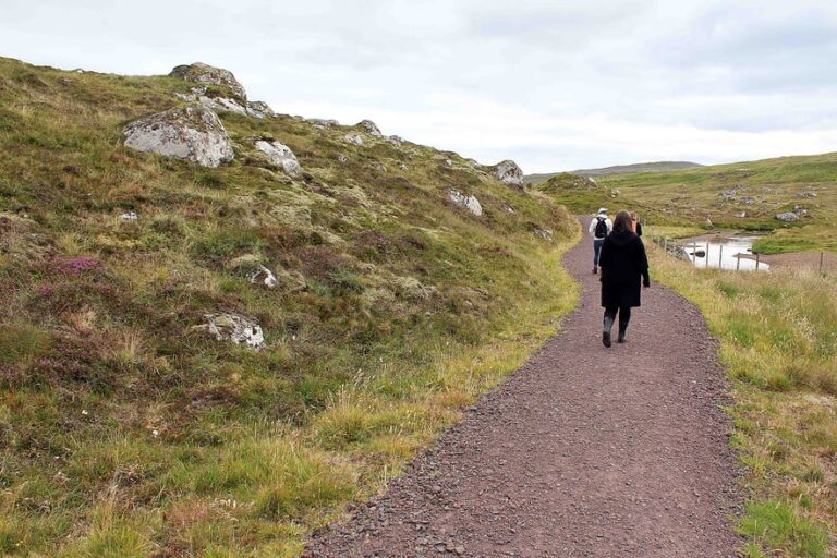Person walking on unpaved path