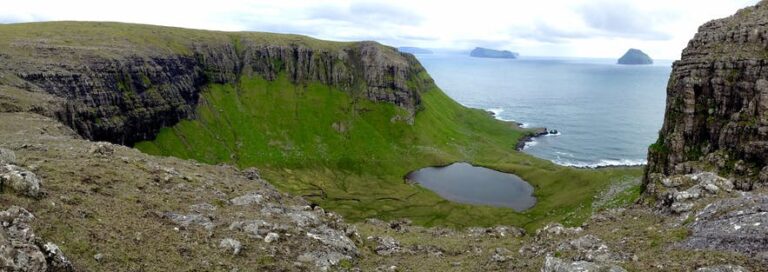Valley with lake and ocean view