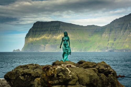 Seal Lady statue on rock