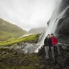 Couple next to waterfall