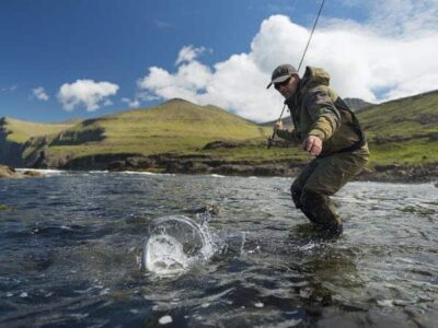 Man catching fish with rod
