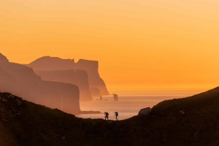 People hiking on Kalsoy Island