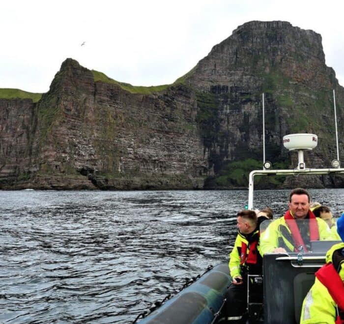 Sailing along Kalsoy Island