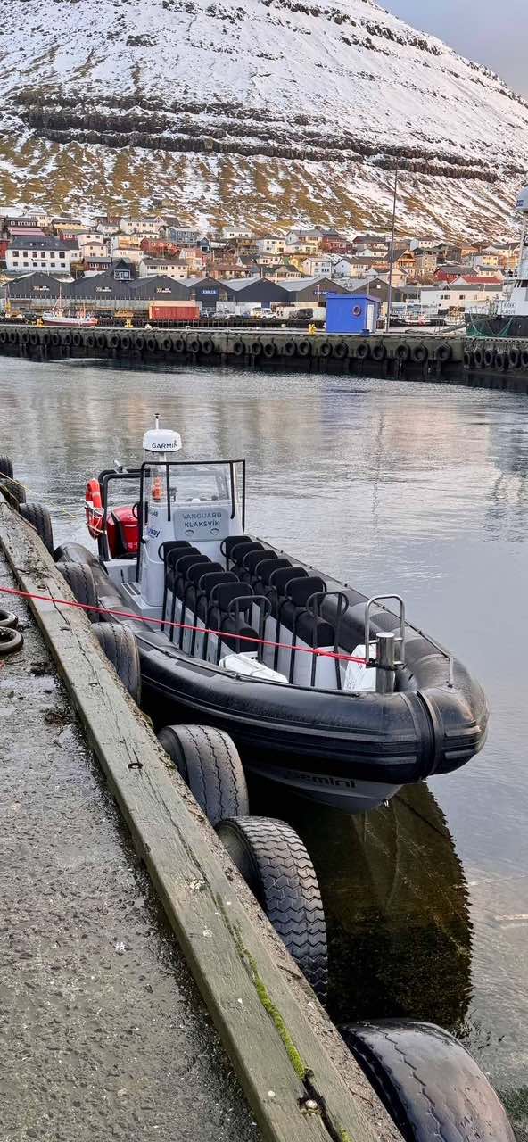 Speed boat moored at harbour Speed boat moored at harbour