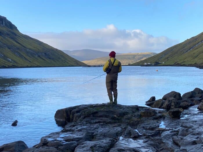 Man fishing in Faroe Islands