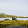 House covered with grass on roof