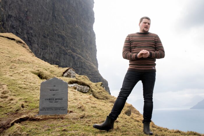 Farmer next to James Bond Tombstone