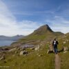 Person hiking in Faroe Islands