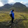 Person hiking in Faroe Islands