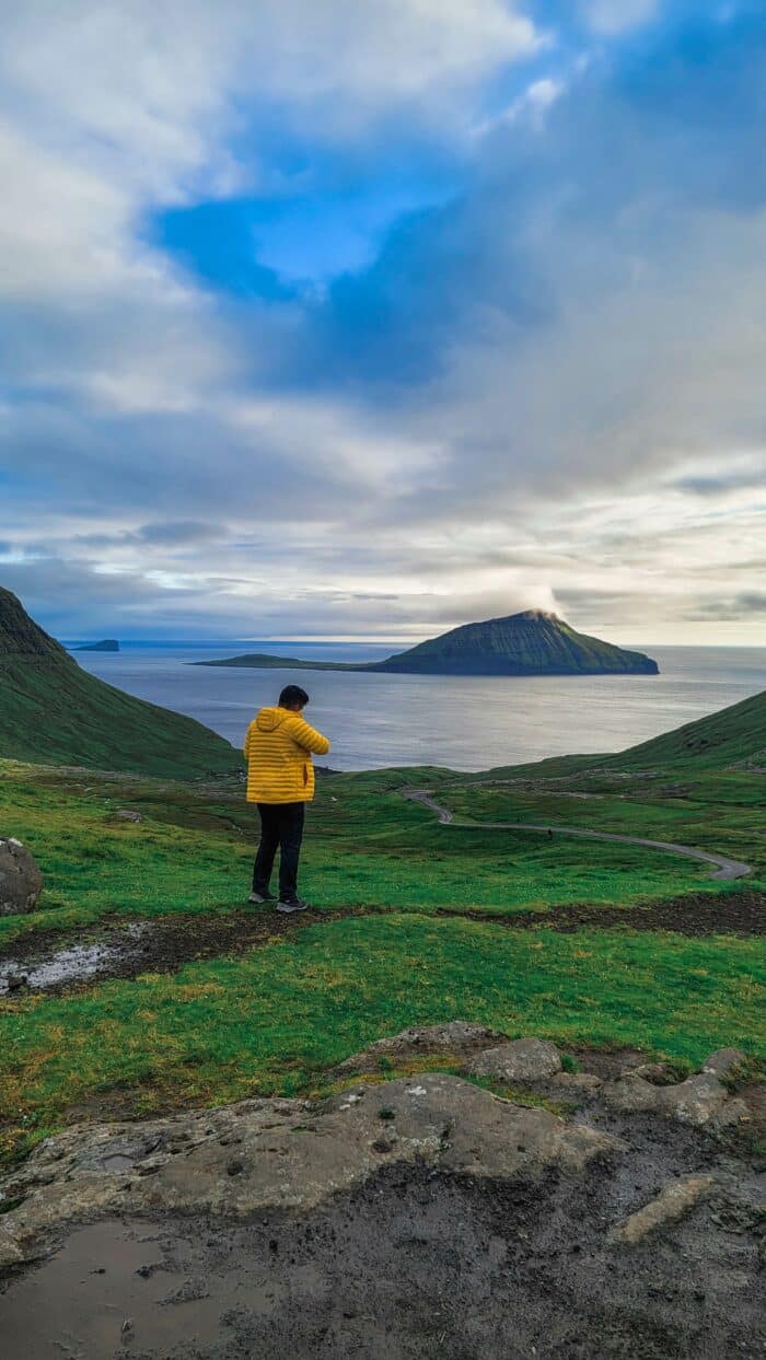 Man in yellow jacket in nature