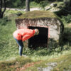 Lady looking into small bunker