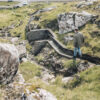 Two persons walking on path