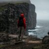 Man standing near cliffs
