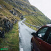 Car driving on road in the Faroe Islands