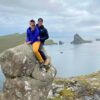 Couple sitting on a stone