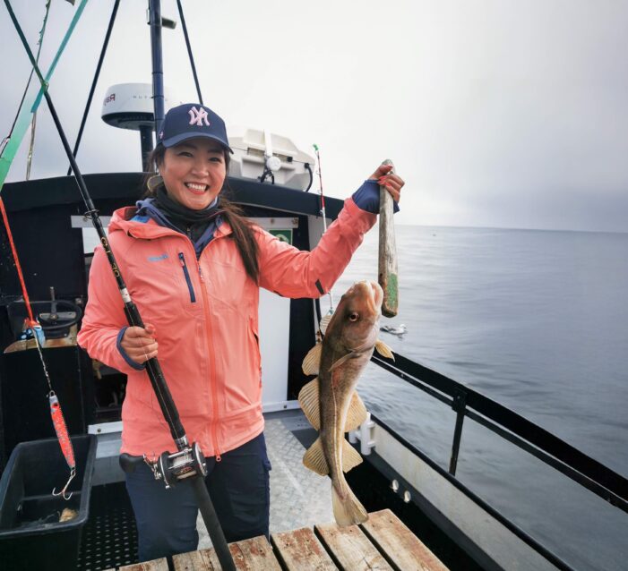 Lady holding fish
