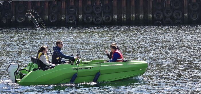 People on Green boat
