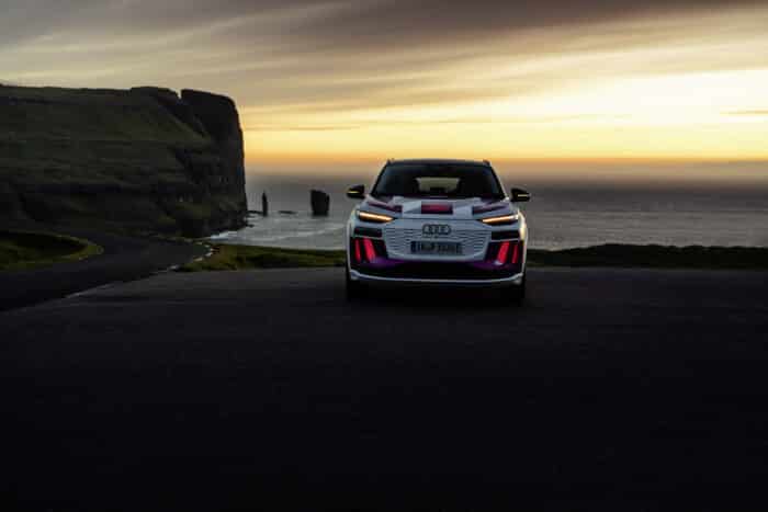 Audi Q6 e-tron in front of sea stacks