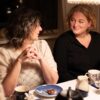 Two women at a dining table