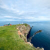 Coastal landscape with red house