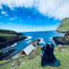 Person watching coastal scenery