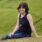 Lady sitting in grass