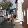 People walking on street in Tórshavn