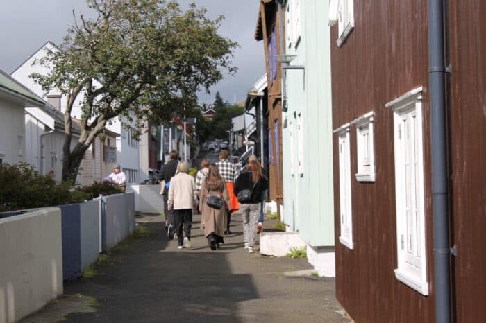 People walking on street in Tórshavn