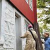 Persons entering door