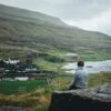 Woman sitting in Eiði Village