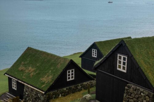 Sod-roof houses with views of islets
