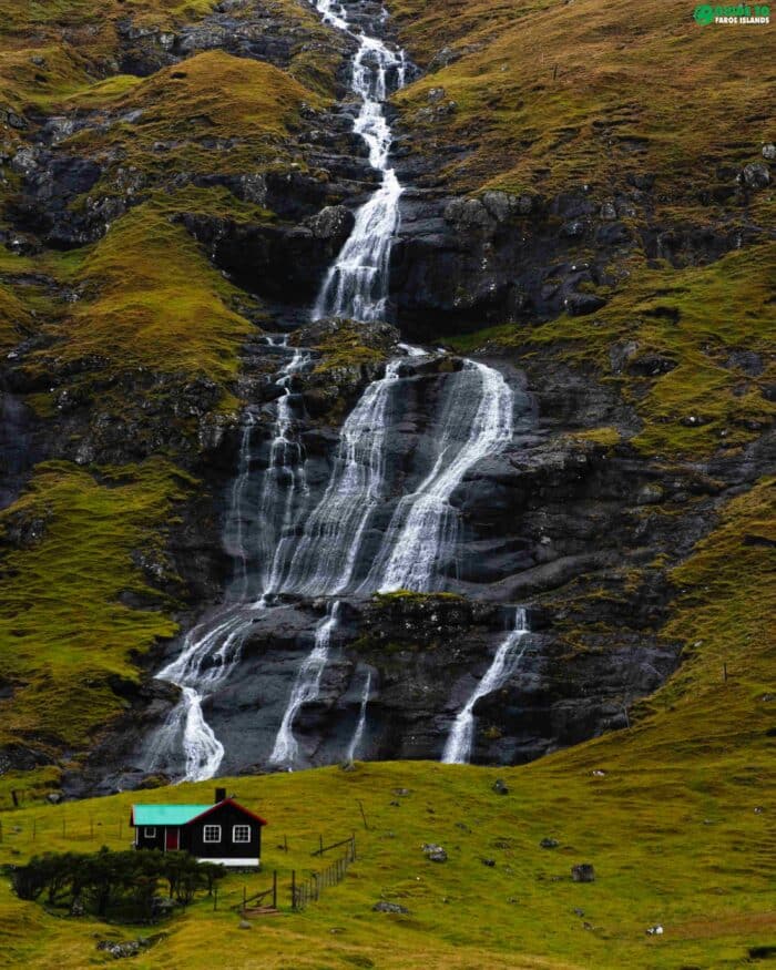 Waterfall and house