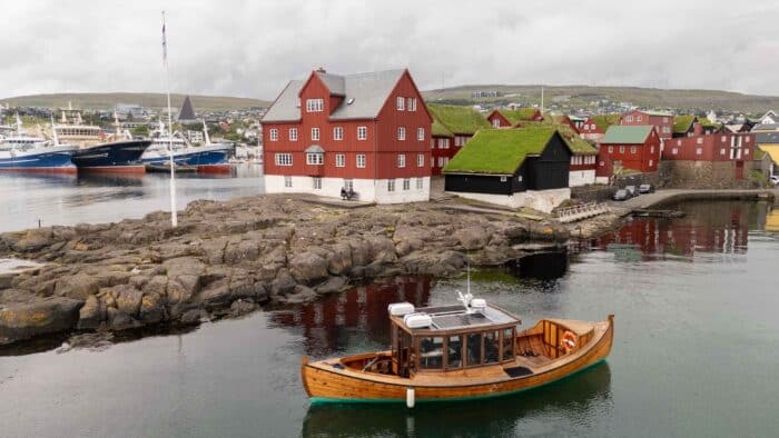 Cruising next to Tinganes Peninsula in Tórshavn.